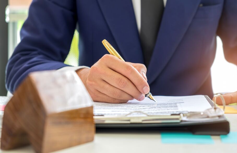 Lettings agent signing documents