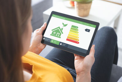 A person looking at an EPC rating on a tablet
