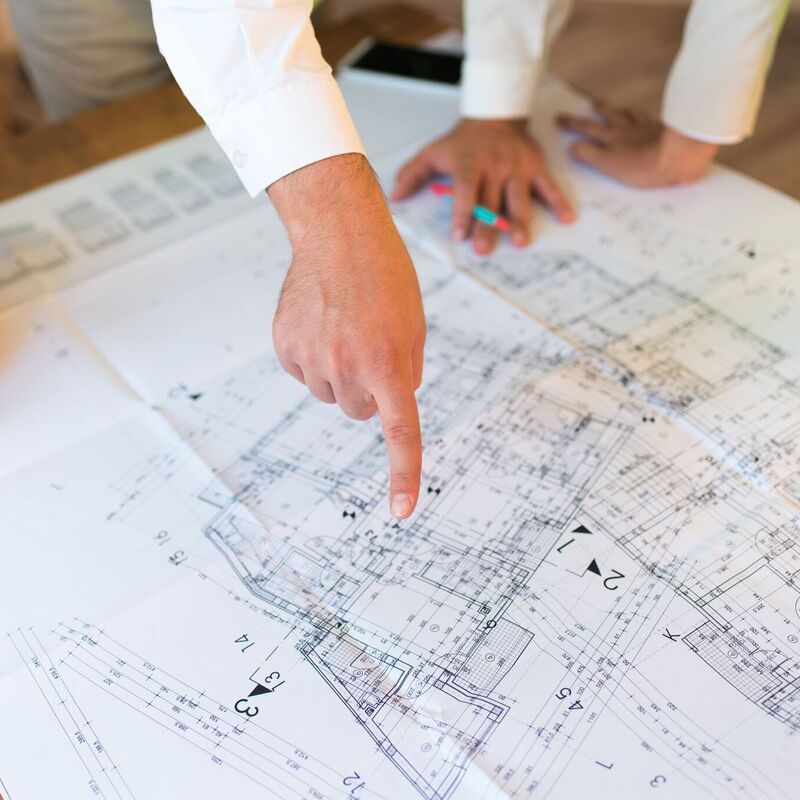 Developer looking at plans